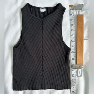 Black tank by Garage